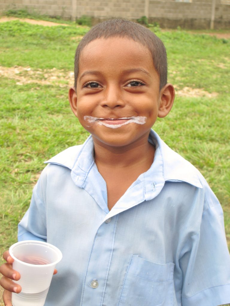 Happy kid with a smile after brushing his teeth