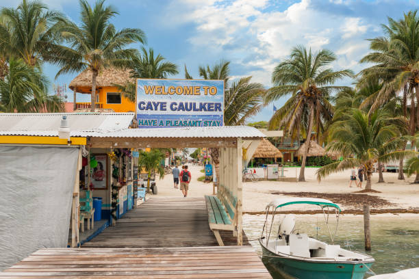 Welcome sign at the wooden pier dock in Caye Caulker.