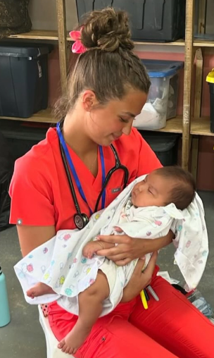 Nurse holding a baby
