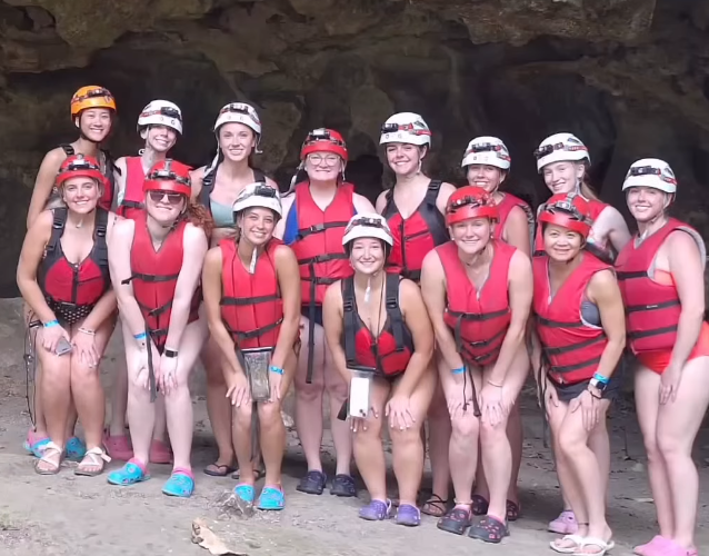 Group of volunteer nurses going for a swim with safety equipment on