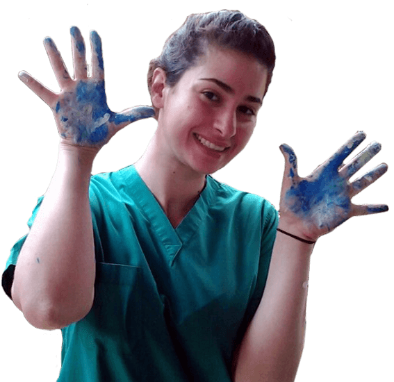 Volunteer nurse with paint on her hands