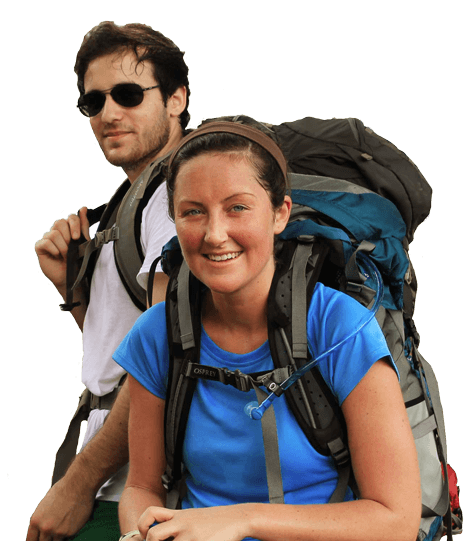 Man and women on a trip with their hiking equipment on