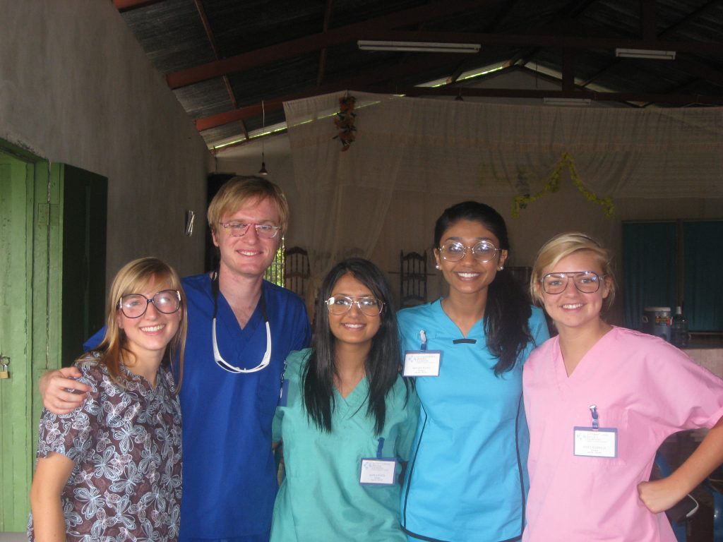 A group of volunteers taking a photo together