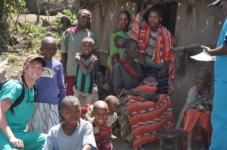 Tanzania villagers with a volunteer doctor