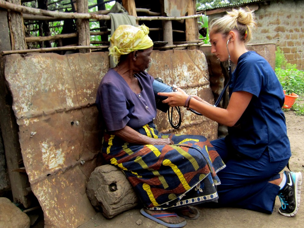 A nurse checking the blood pressure of villagers in Tanzania