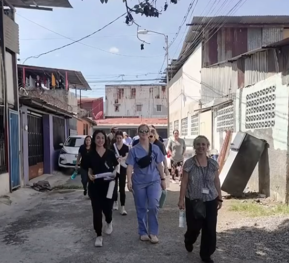 A group of volunteers walking through a local area in Costa Rica