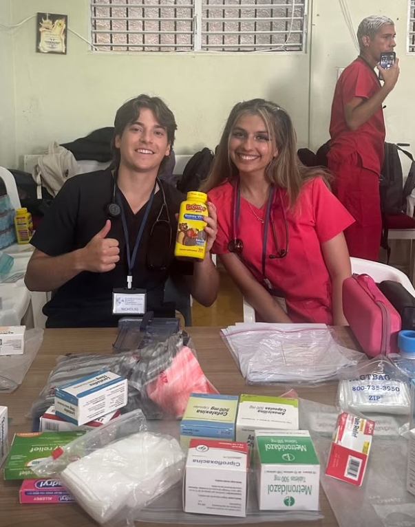 Two volunteers taking a photo together