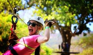 A ISL volunteer ziplining